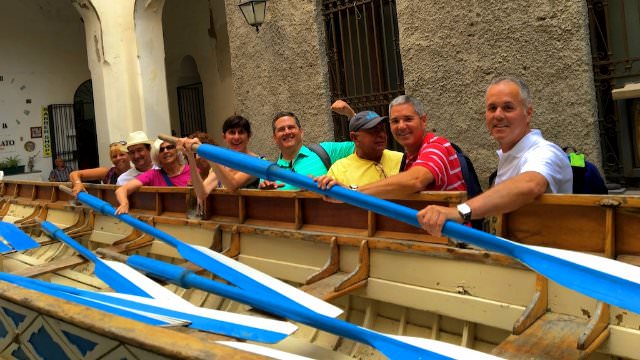 Learning about the annual regatta that takes place in Amalfi. 